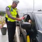 Personel Sat PJR Ditlantas Polda Sumbar bersama pihak pengelola ruas Tol Padang–Sicincin dan karyawan HK menggelar kegiatan operasi simpatik kepada para pengguna jalan tol, Rabu (13/5/2026).