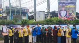 Pengurus DPD KNPI Pasaman Barat bersama Koramil Simpang Empat, BEM Akademi Kebidanan Pasaman Barat, serta mahasiswa Yaptip Pasaman Barat.